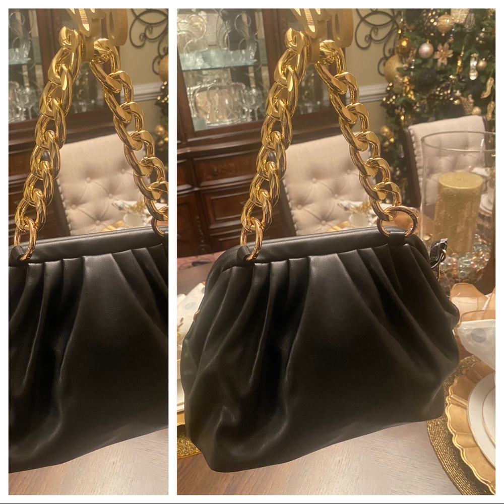 New with tags. Black Elegant Handbag with a gold tone chain strap and long strap